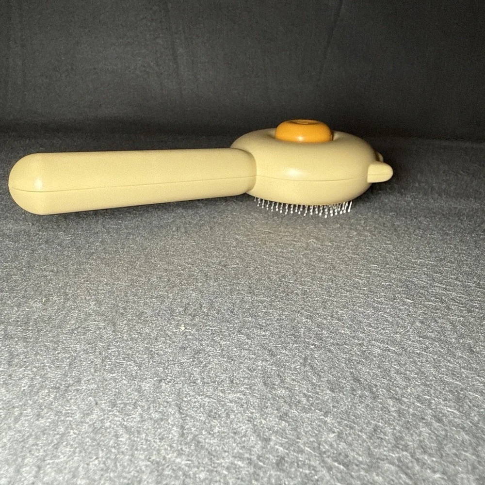 Effortless Pet Grooming with Paw Shaped Self-Cleaning Brush for All Pets